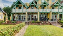 R�ckansicht des Hauses Maritimes Ferienhaus am Wasser mit eigenem Bootsanleger im Hafendorf Rheinsberg