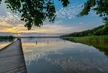 Abendstimmung am Rheinsberger See Mit direktem Wasserzugang, privatem Bootsanleger und Insel-Lage: Ferienhaus im Hafendorf Rheinsberg