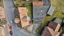Luftaufnahme - Geb�ude und Garagenanlage Gefragte Lage nahe dem Steinhuder Meer - attraktives Wohn- und Gesch�ftshaus �ber 6,7 % Rendite