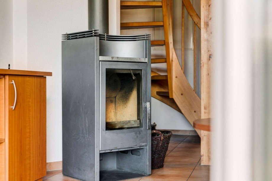 Wohnbereich mit Kaminofen Reihenmittelhaus Rheinsberg