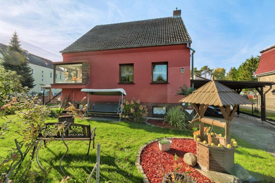 Hausansicht mit Vorgarten und Carport Einfamilienhaus M�llrose