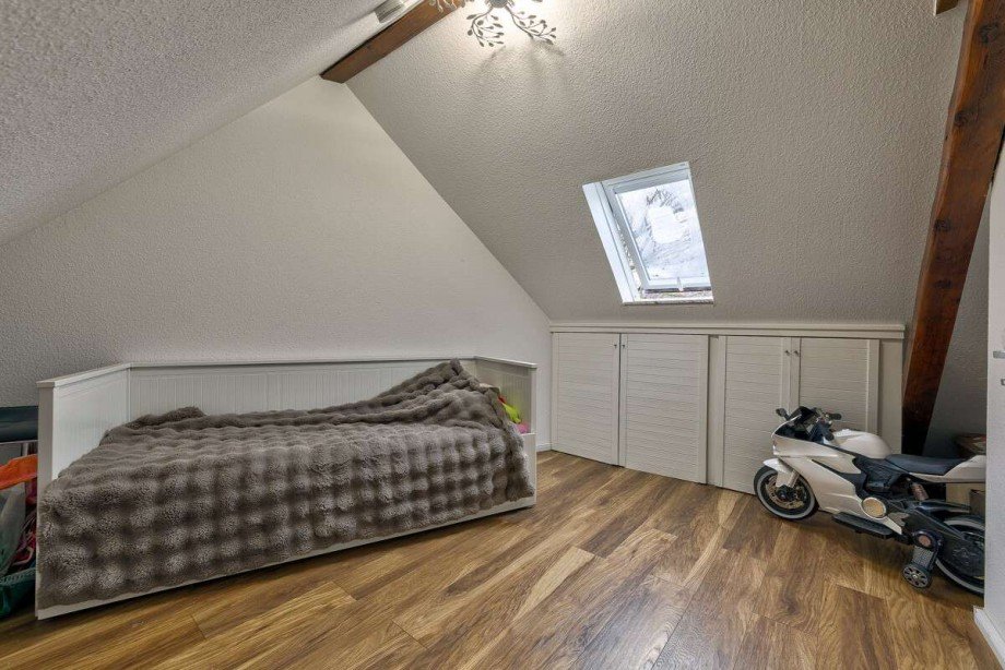 Weiteres Schlafzimmer im Dachgeschoss Mehrfamilienhaus Wunstorf