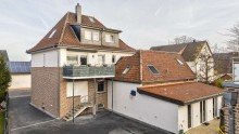 Hofansicht mit Anbau und Stellfla 4 Wohneinheiten unter einem Dach - kernsaniertes Mehrfamilienhaus