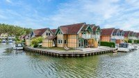 Bild (cbc34396b6665ee1668fe527b708fd08): FERIENHAUS MIT ZWEI BOOTSANLEGEPL�TZEN IN BESONDERER WASSERLAGE