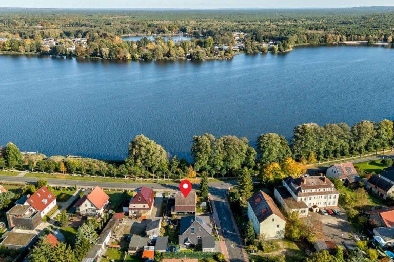 Hauslage in erster Reihe am Muser See M�llrose Einfamilienhaus Vermietetes Einfamilienhaus am M�llroser See - Kapitalanlage in bester Lage von M�llrose
