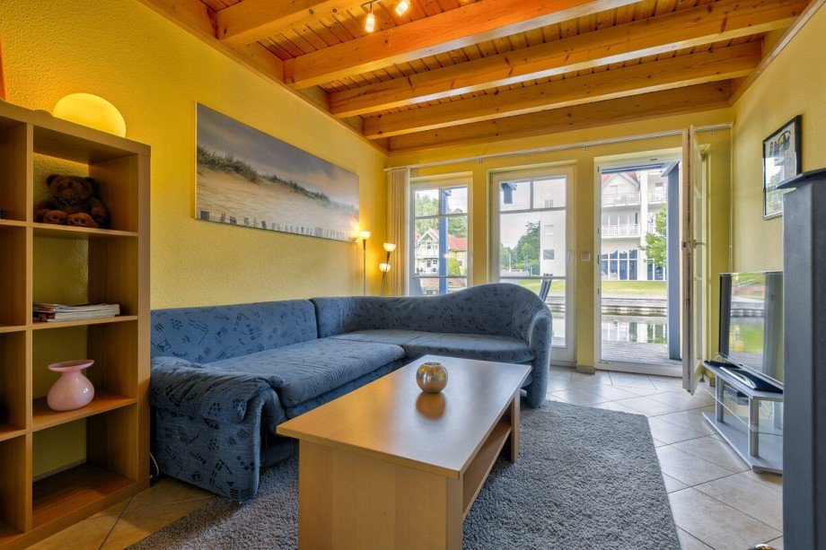Wohnzimmer mit Blick aufs Wasser Ferienhaus Rheinsberg
